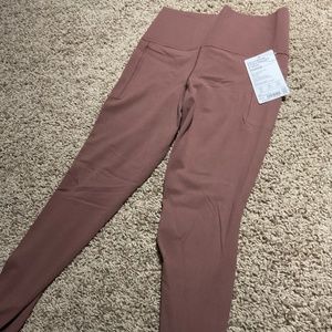 Athleta salutation stash pocket tight